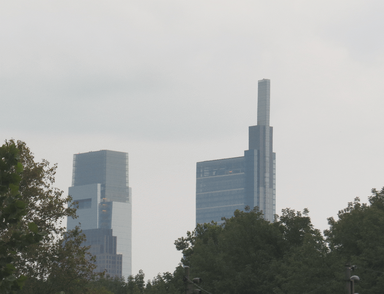Two high buildings in the distance.