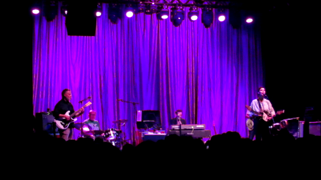 Wide shot of band proforming.
